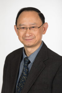 headshot of man in suit